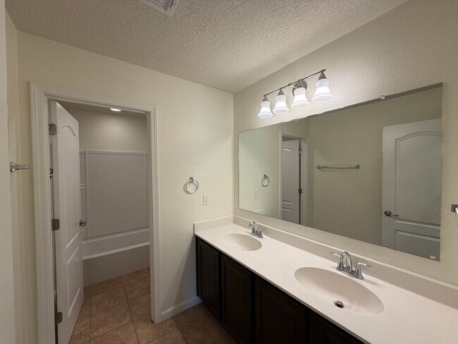 Building Photo - 4 Bedroom + Office Home Available Near Loma Colorado Blvd NE & Broadmoor Blvd NE in Rio Rancho!