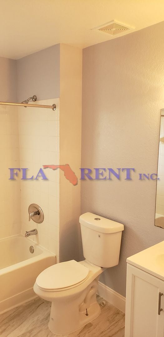 Building Photo - 4 BR / 3 FULL BATH (INCLUDES 2 MASTERS) 2 STORY (NEAR DISNEY!) GATED COMMUNITY WITH COMMUNITY POO...