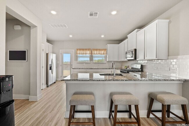 Building Photo - 6410 Comanche Sky