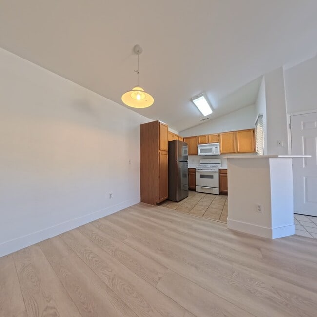 Building Photo - Upgraded 1 Bed 1 Bath Second-Story Condo at Opulence!