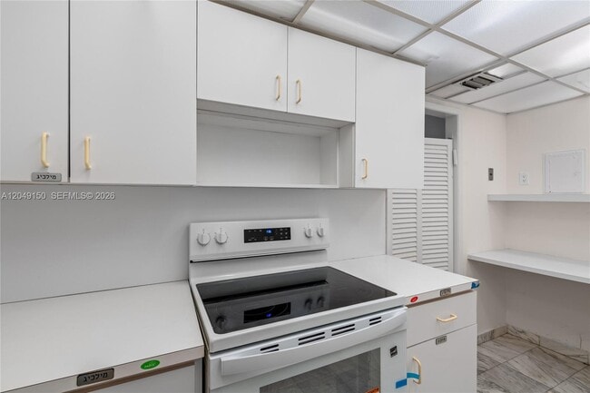 Building Photo - 5005 Collins Ave