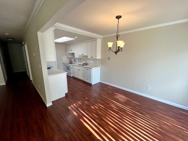 Kitchen from dining area - 2122 E 8th St