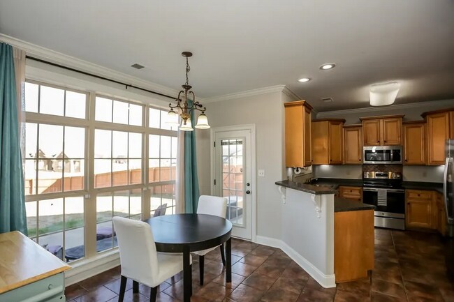 Building Photo - Stunning Atoka Home Offering Space, Style, and Convenience!