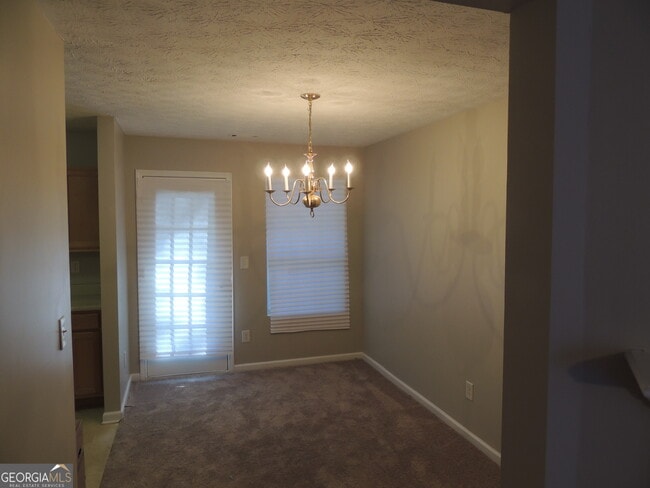 Building Photo - 5659 Windfall Ln