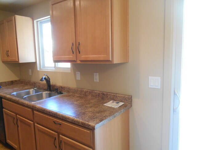 Building Photo - South Reno: Three Bedroom Home w/ RV Parking