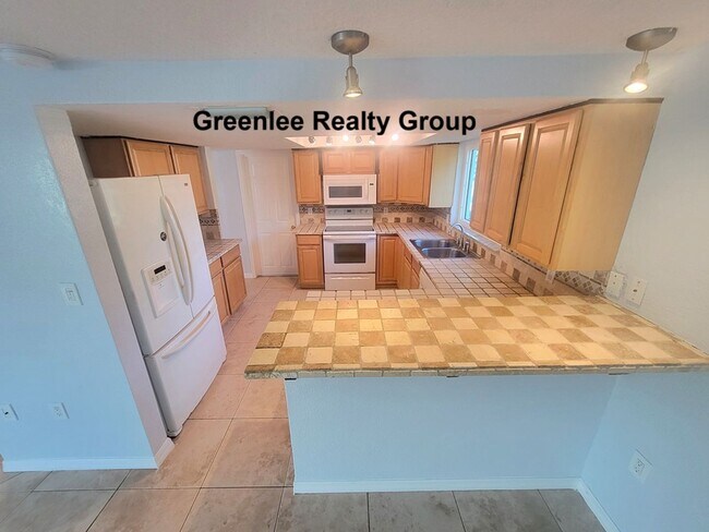 Building Photo - 7741 Treasure Pointe Dr