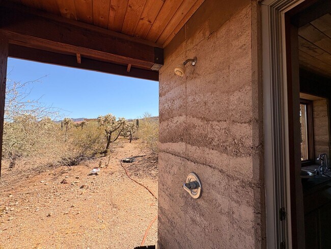 Building Photo - Desert Home on 3.3 Acres with Rooftop Views & Unique Rammed Earth Design