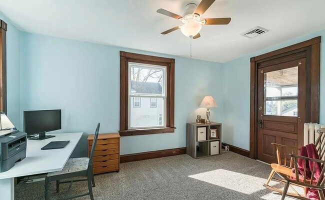 Building Photo - Spacious 4-Bedroom Home with Sunroom, Garage & Private Driveway!