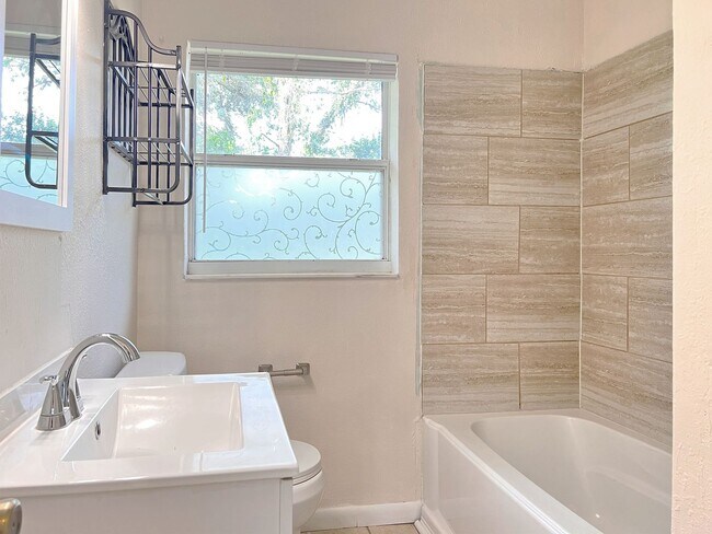 Building Photo - Three-Bedroom Home with Spacious Family Bo...