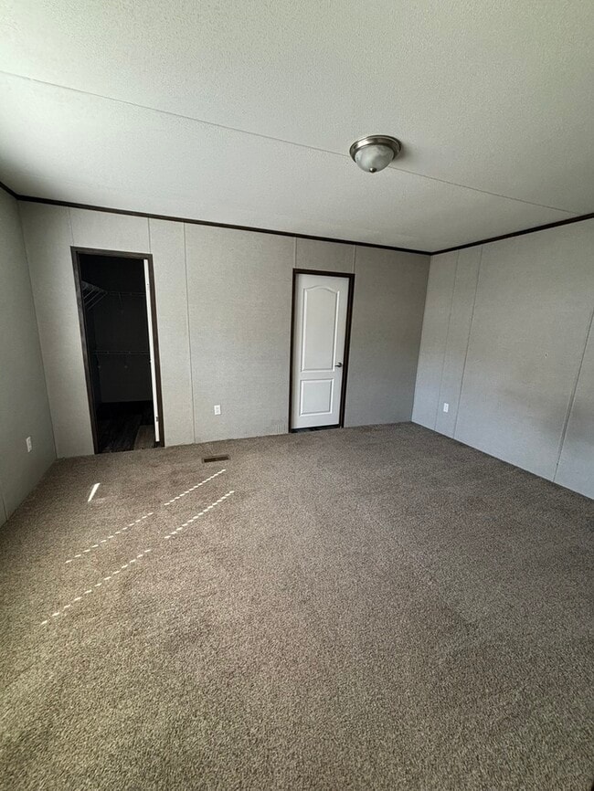 Building Photo - Triangle Mobile Home Park