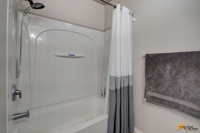 Building Photo - East Anchorage Home with Utilities Included!! Close to JBER! Attached Two Car Garage + Fenced in ...