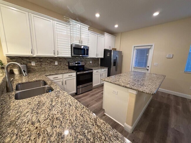 Building Photo - 5637 Water Rose Rd