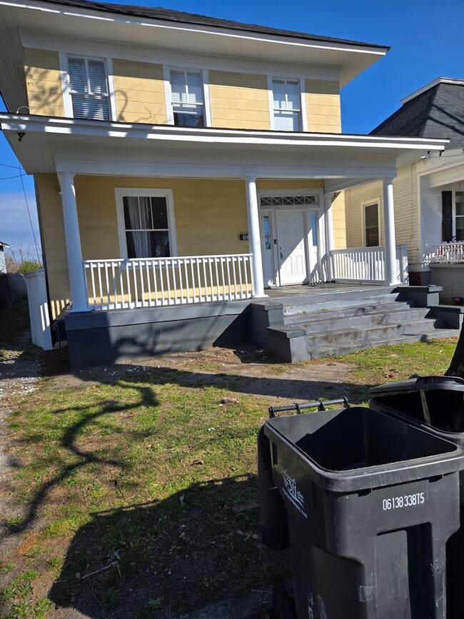 Primary Photo - Single family home with covered front porch