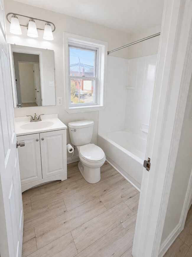 Building Photo - Renovated Home with Modern Kitchen, Basement & Natural Light