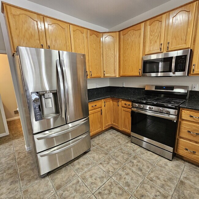 Building Photo - 3 Bedroom, 3.5 Bath Ranch with Open Floor Plan, Finished Basement & Scenic Pond Views