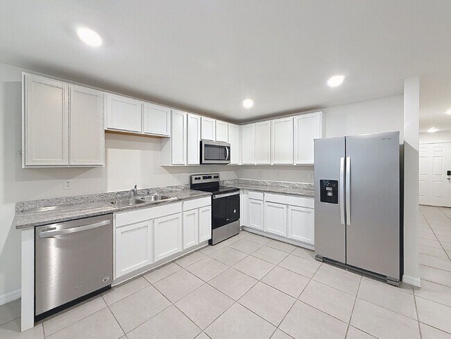 Building Photo - 3210 Suncoast Plains Dr