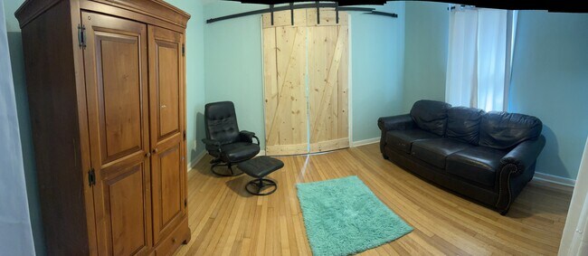 Sleeper sofa sleeps two. Barnyard doors create privacy.Armoire provides storage - 5119-1 Avenue Q