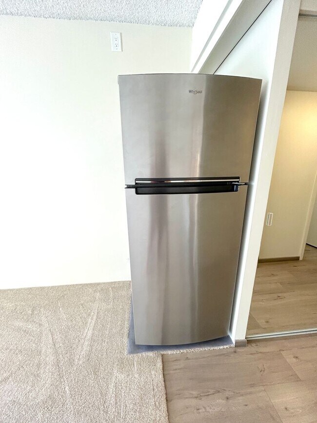 Building Photo - Available Now - High Floor Studio Apartmen...