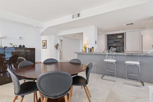 Building Photo - 10275 Collins Ave