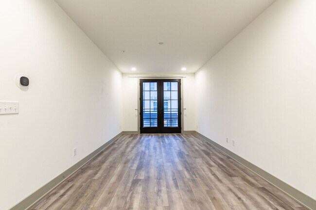 Building Photo - Modern Living Meets Walkable City Charm in...
