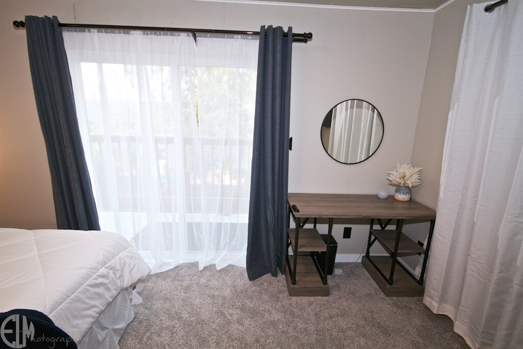 Larger Bedroom - 5540 Four Winds Dr