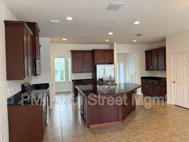 Building Photo - 8130 Red Stopper Ln