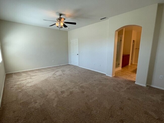 Building Photo - Stunning Home in a Desirable Gated Community