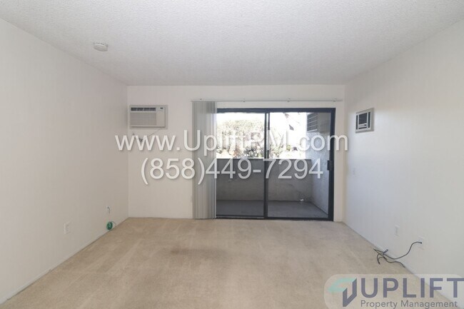 Building Photo - Charming 1 Bed / 1 Bath Condo in Gated Community in a Prime Central Location