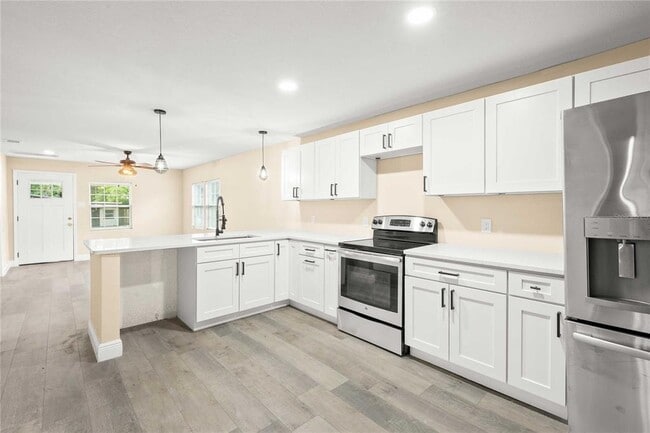 Building Photo - 3204 E 23rd Ave