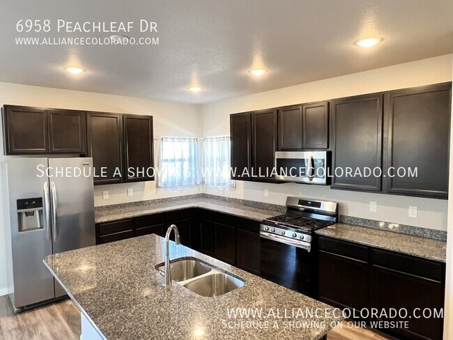 Building Photo - 6958 Peachleaf Dr