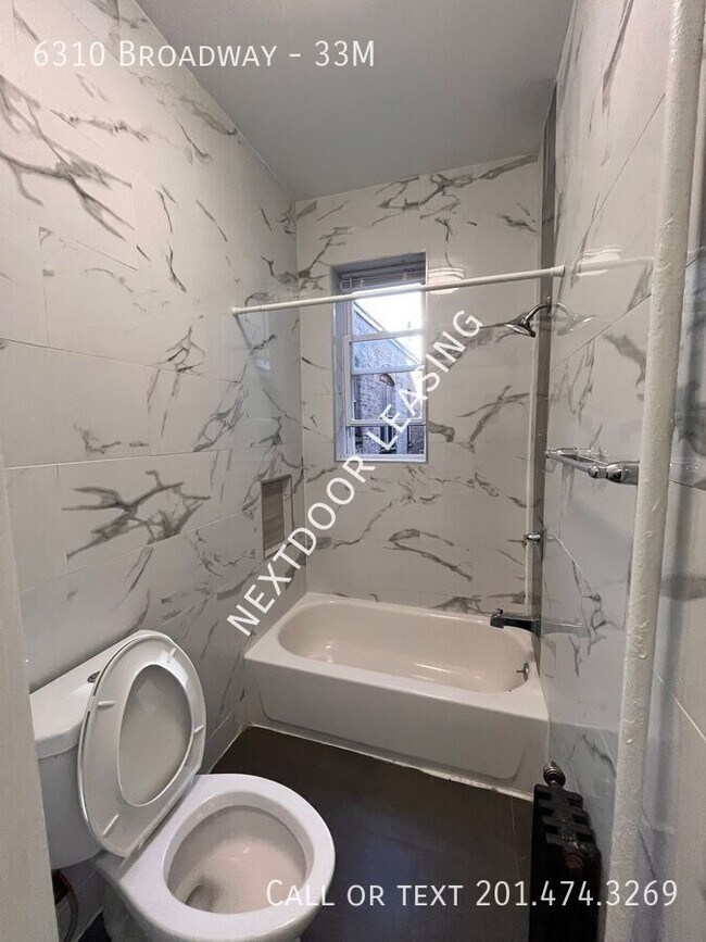 Building Photo - 6310 Broadway-33M