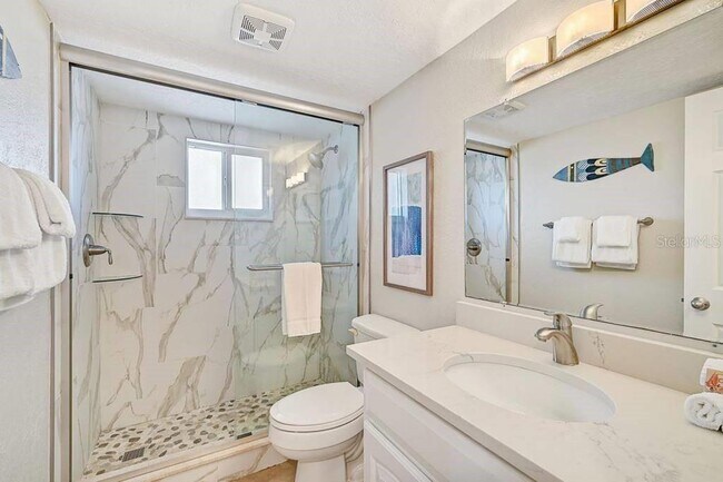 Building Photo - 6154 Midnight Pass Rd