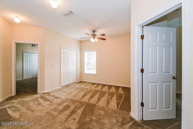 Building Photo - 7068 Rapid River Dr W