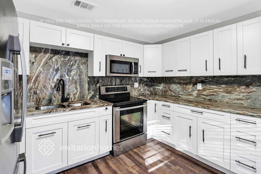 Building Photo - 8718 N Mandarine Pl