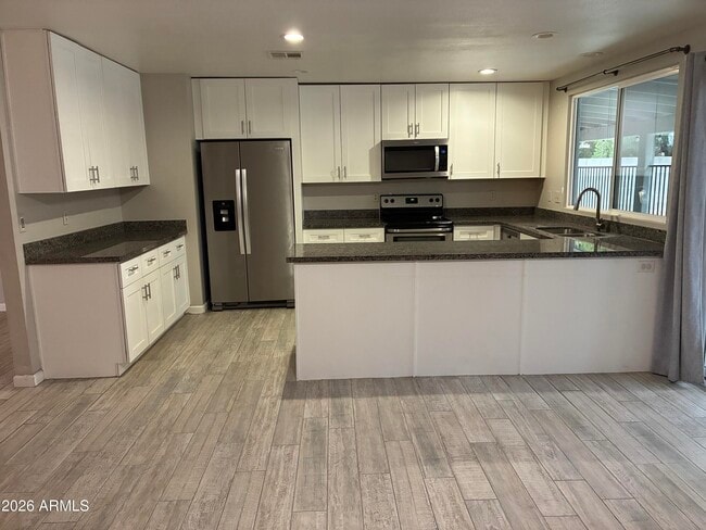 Building Photo - 6713 W Carol Ave