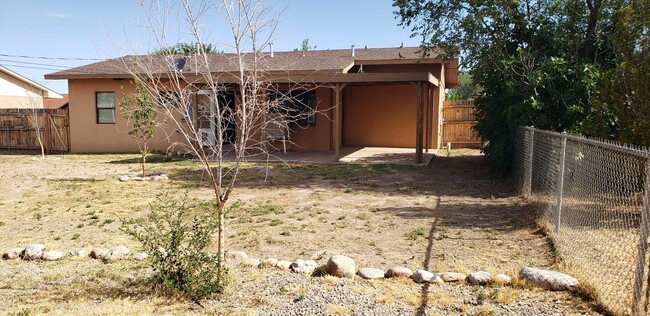 Building Photo - 3 Bedroom, 2 Bath with large fenced in bac...