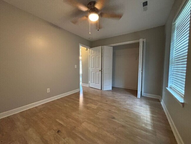 Building Photo - You will LOVE the fenced yard!