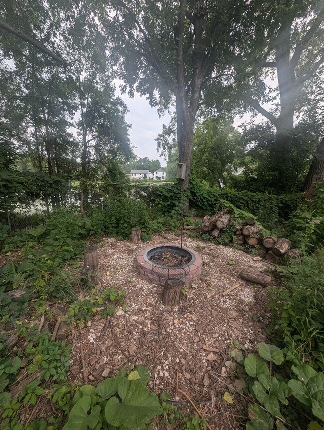 Building Photo - Charming Garden Oasis in West St. Paul – Fire Pit, Pond & Prime Location!