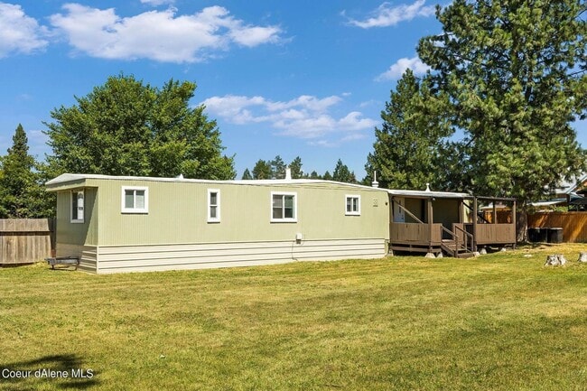 Building Photo - Manufactured Home 3 bed 1.5 bath RV Parking/Fenced Yard