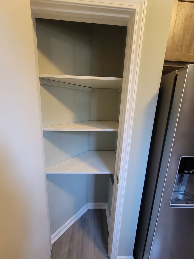 Building Photo - Renovated first floor condo with community...