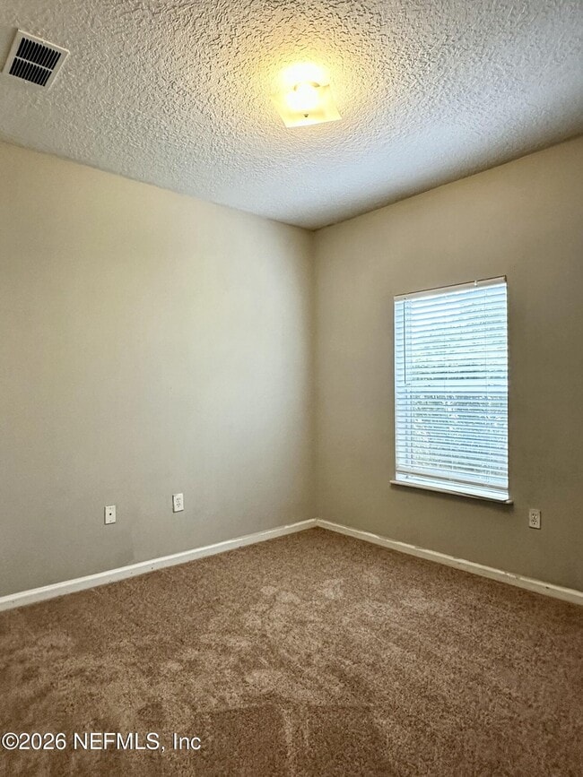 Building Photo - 6985 Ortega Woods Dr