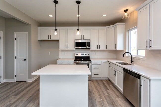 Building Photo - Spacious 4-Bedroom Home with 2-Car Garage & Yard