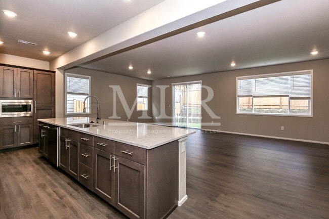 Building Photo - Elegant 4BR Covington Rental with Chef’s K...