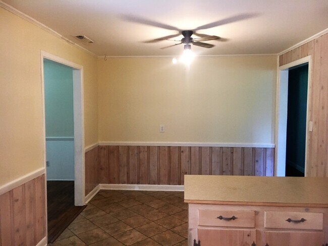 Building Photo - Cottage style brick ranch home, carport, f...