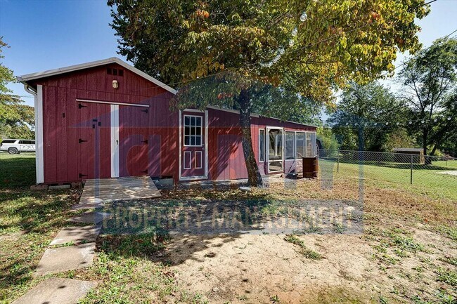Building Photo - Updated house with carport and shed on corner lot!