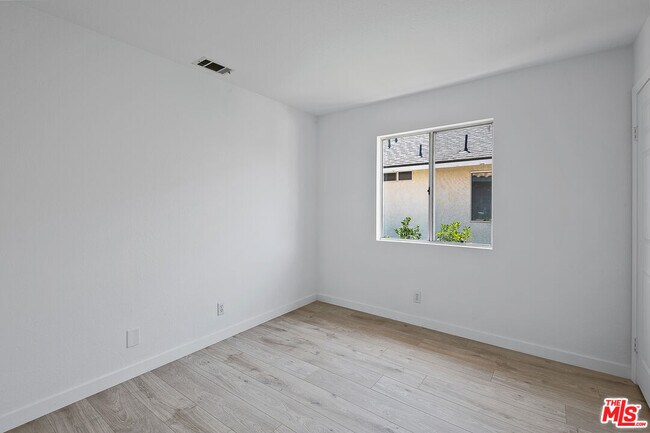 Building Photo - 8473 Penfield Ave