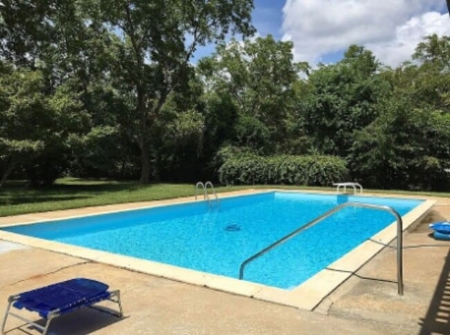 Building Photo - Luxury Ranch Living: Pool, Privacy & Premium Space