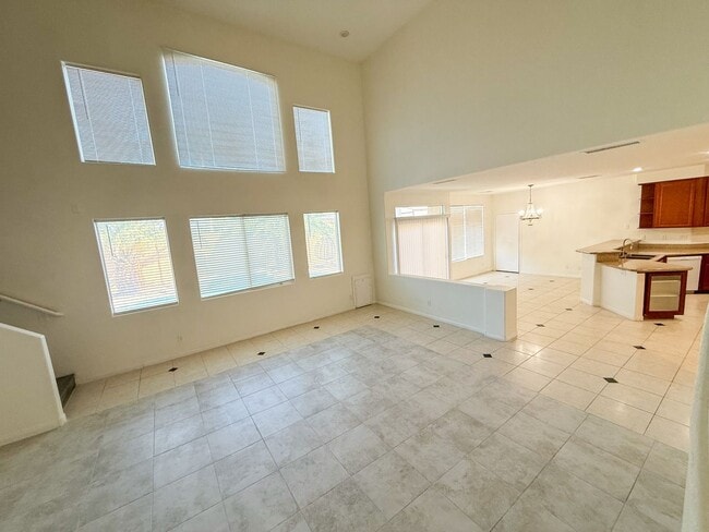 Building Photo - SPACIOUS HOME IN GATED COMMUNITY WITH POOL, RV PARKING & 4-CAR GARAGE!