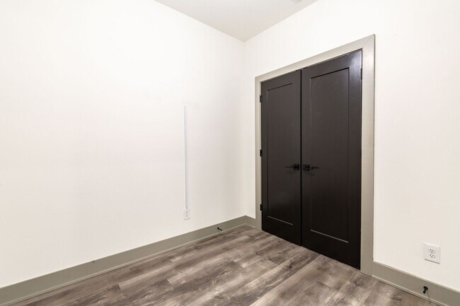 Building Photo - Modern Living Meets Walkable City Charm in...