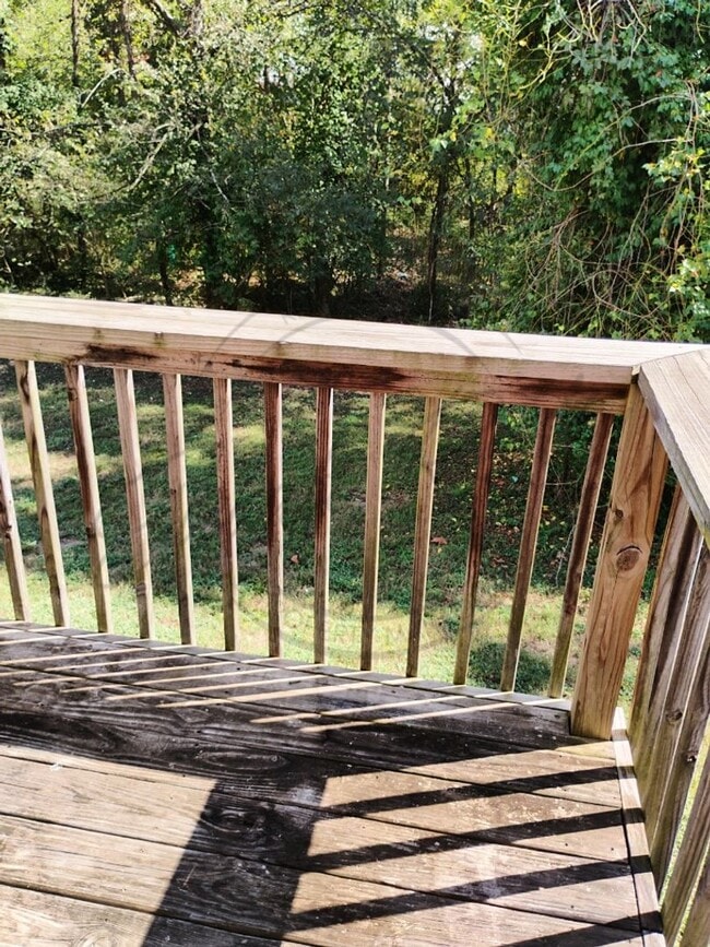 Building Photo - Two Bedroom Townhouse with deck near Trini...